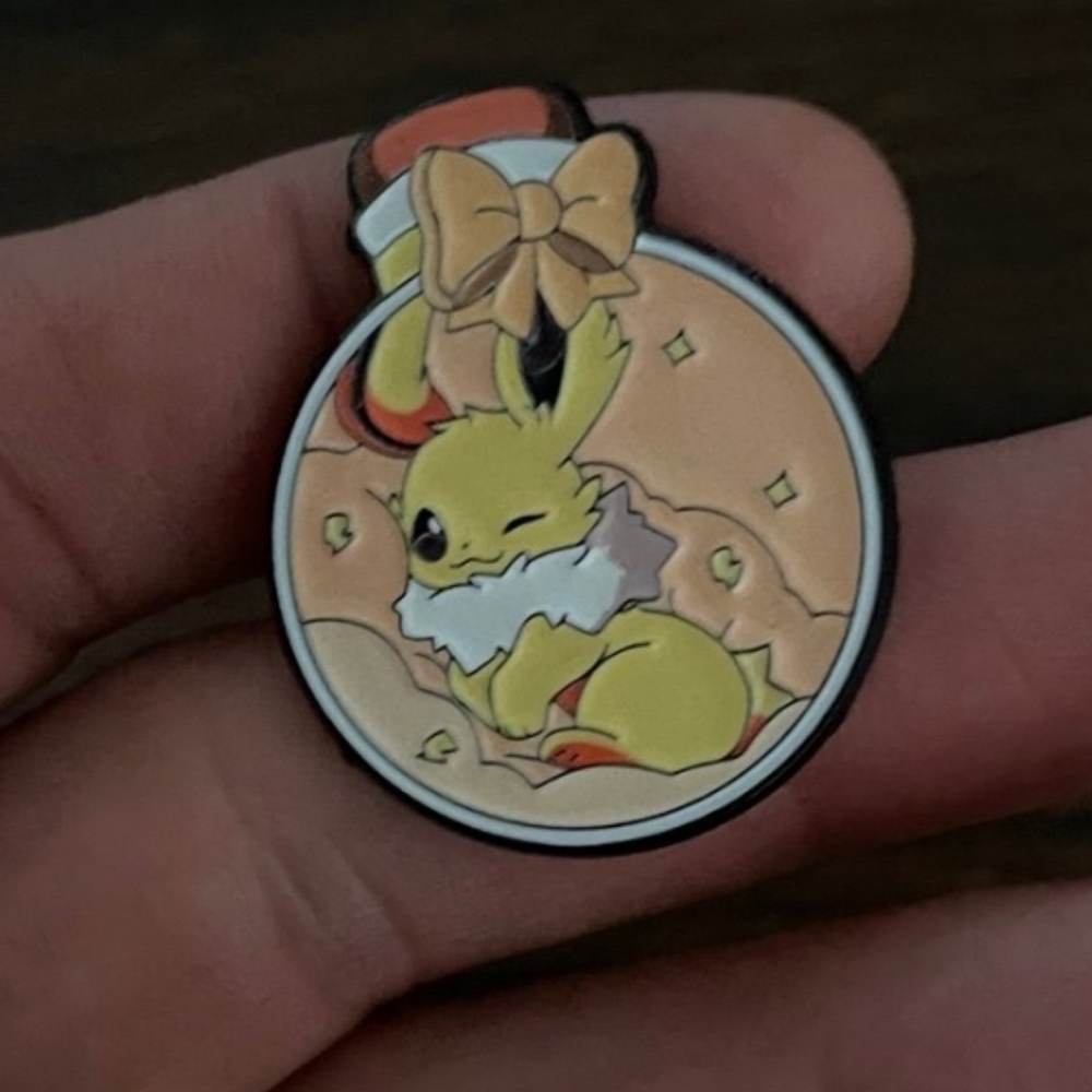Pokemon Yellow and Orange Pet Charm